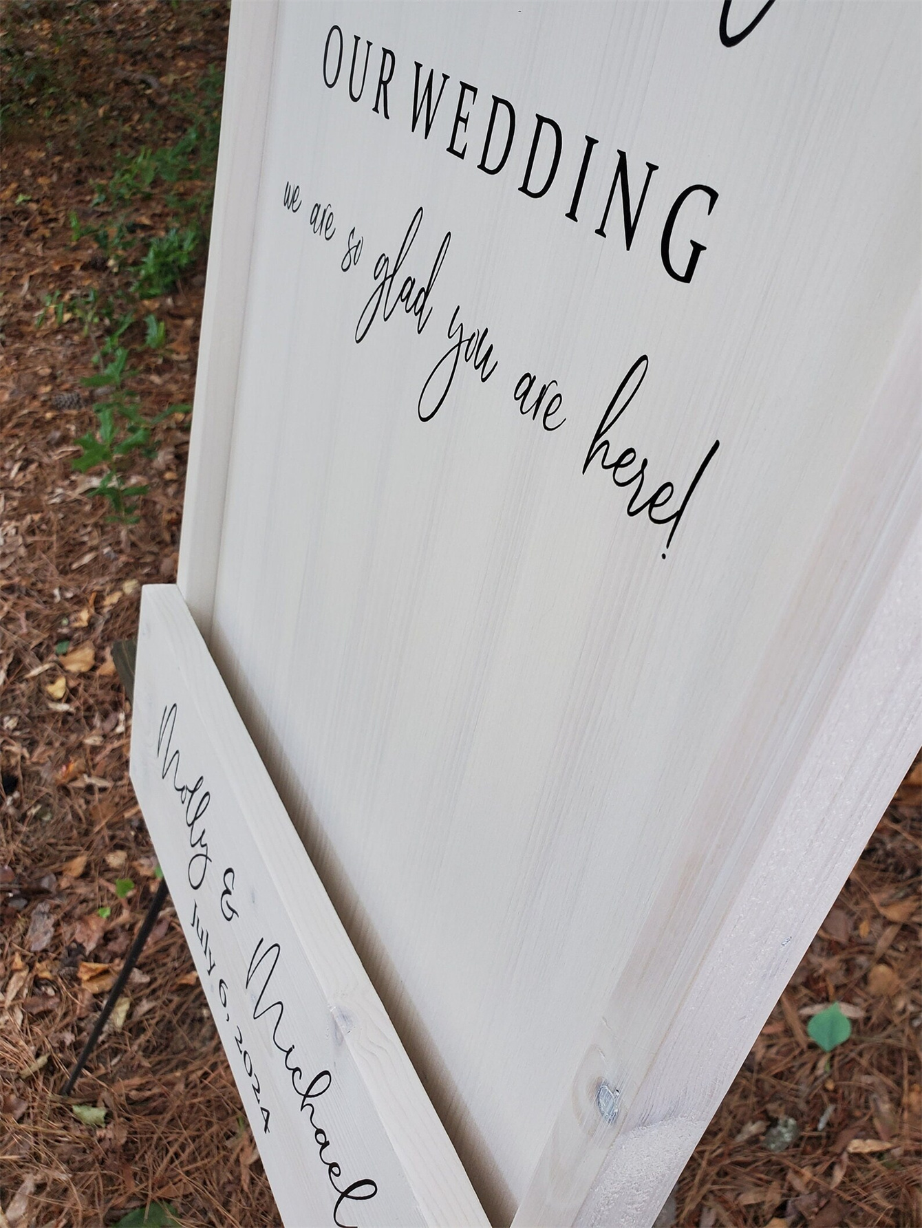 Wooden wedding welcome signs and flowers, custom flower box wedding signs, simple wedding entrance decorations, personalized name and date signs, ceremony reception